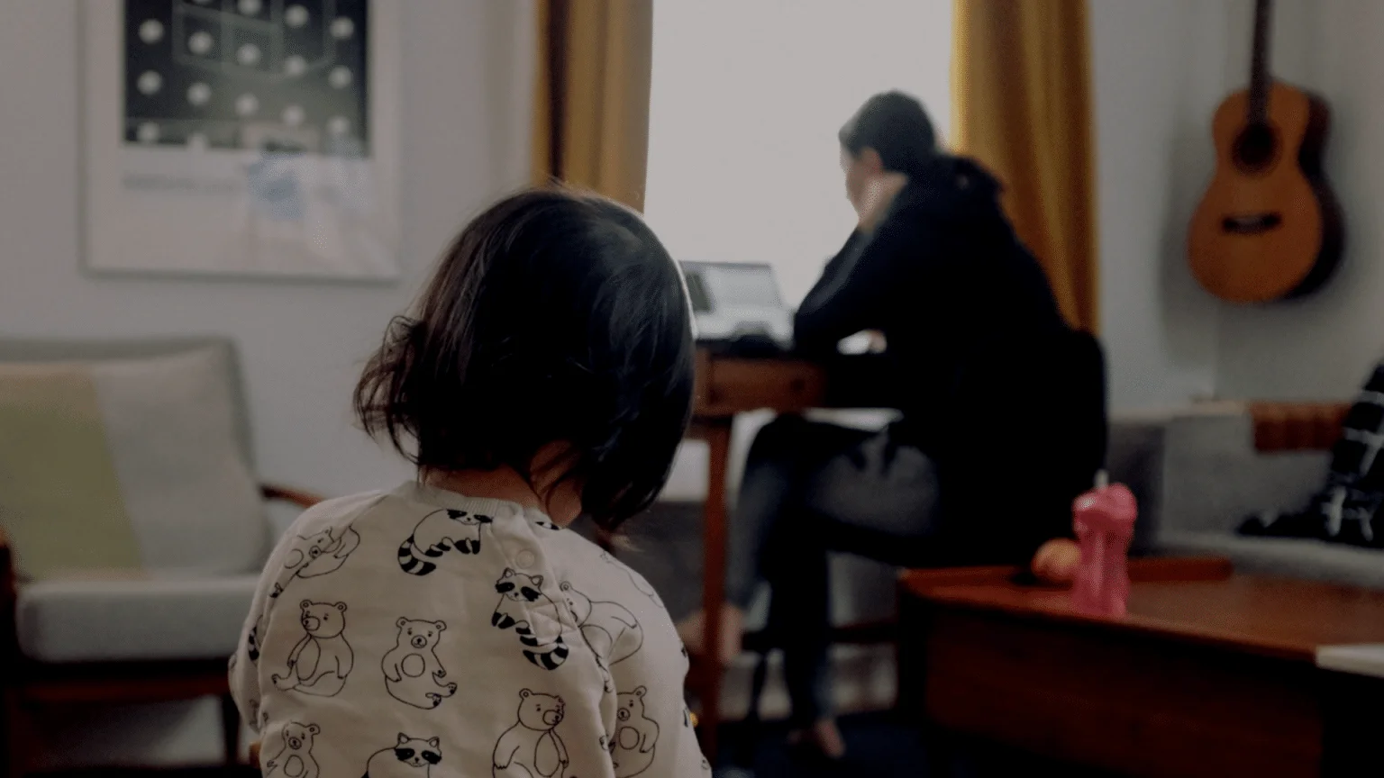 Employee working from home, illustrating health examinations and surveys in proactive occupational healthcare