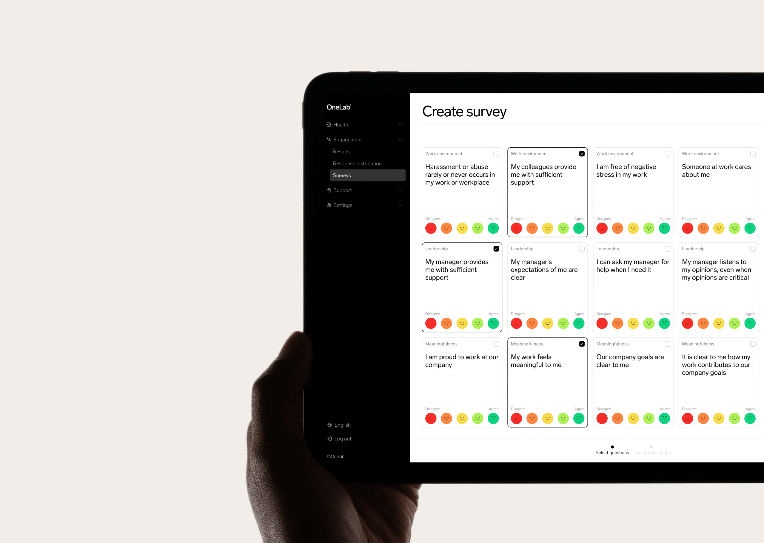 Create survey screen on a tablet showing the OneLab employee survey question library with rating scales
