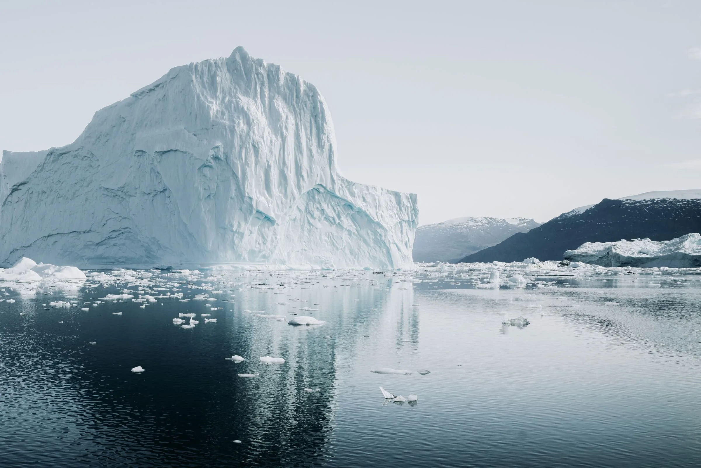 Iceberg above and below the waterline illustrating hidden work-related ill health that preventive health examinations reveal